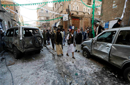 People gather at the site of a bomb explosion in Sanaa. (File photo: Reuters)