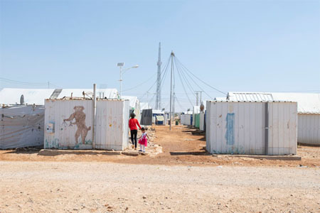 A girl plays outside at the Azraq refugee camp in Jordan, which is home to about 35,000 people.