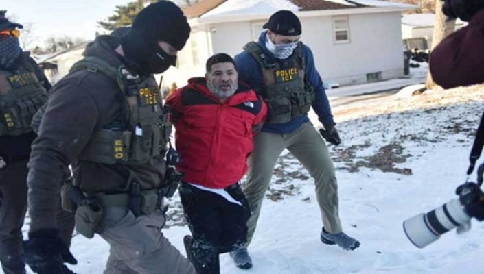 Masked and armed Immigration and Customs Enforcement officers carry out arrest campaign in Minneapolis