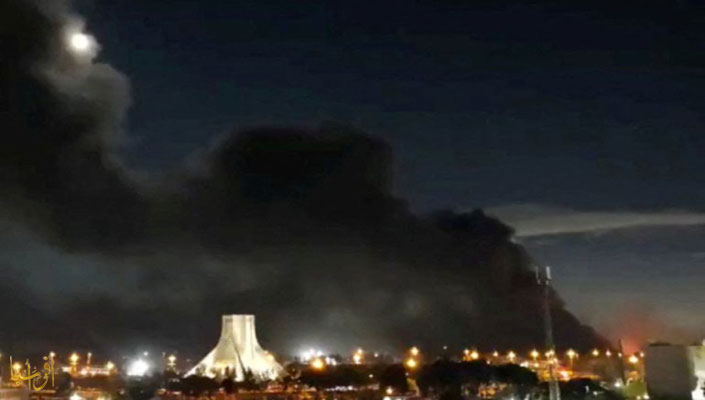 Thick smoke rises over Azadi Square following an airstrike, amid the US-Israeli conflict with Iran .