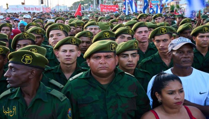 Cuban military members participate in a protest march against U.S. policies toward Havana 