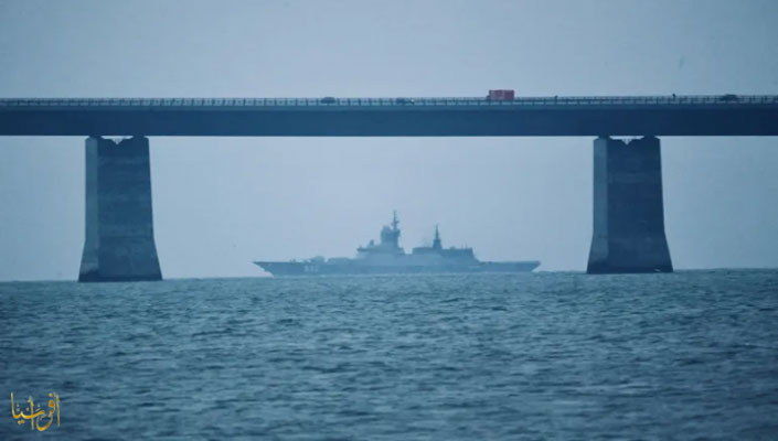 The Russian Navy's Buike Strigoshy-class frigate under the Great Belt Bridge to the Baltic Sea, in Korsor, Denmark (Reuters)