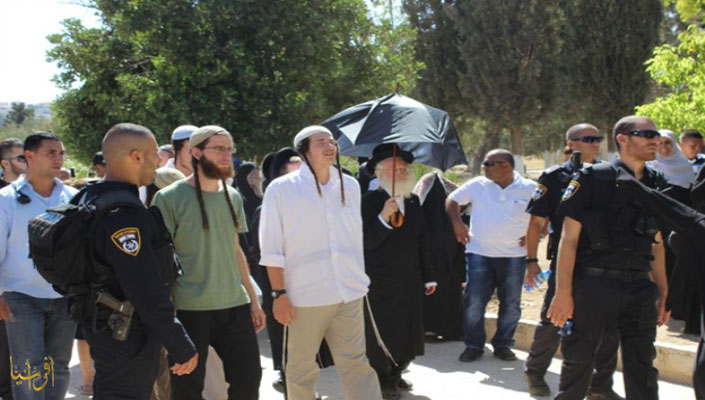 Extremist settlers during the storming of Al-Aqsa Mosque under the protection of the occupation police 
